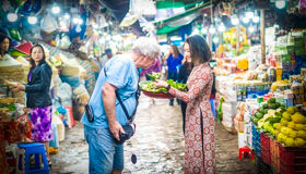 Immerse in the vibrant bustle of Hue’s morning markets
